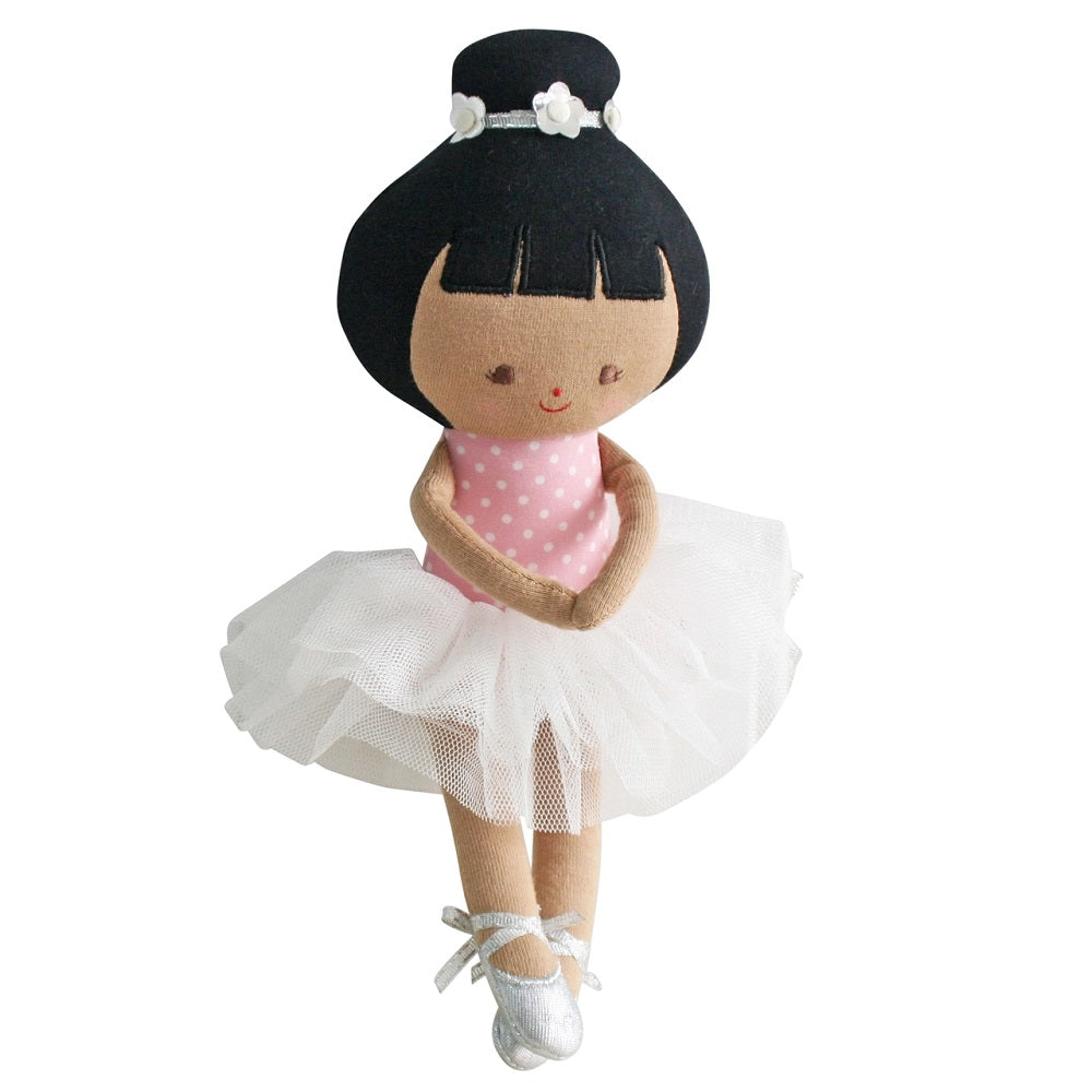 Ballerina doll with black hair, white tutu, pink polka-dot leotard, and silver ballet shoes.