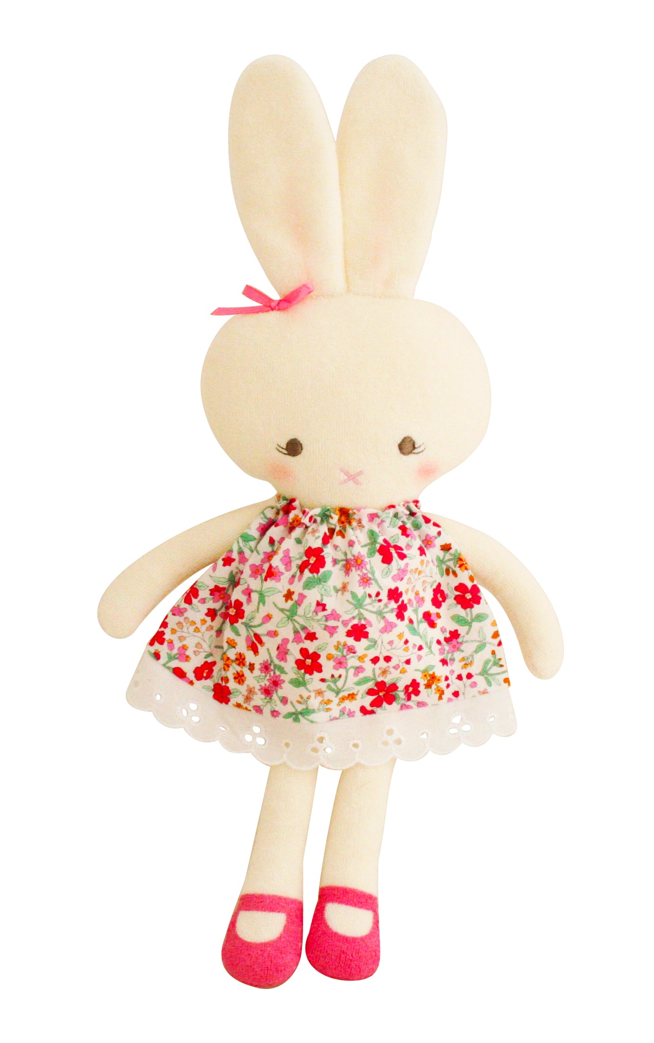 Stuffed bunny doll in floral dress and pink shoes.