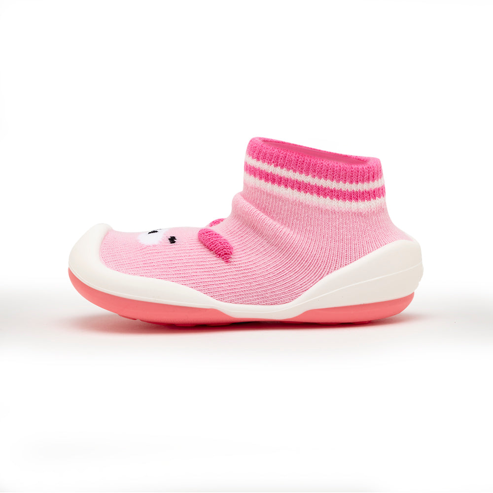 Pink sock-shoe with animal face detail.