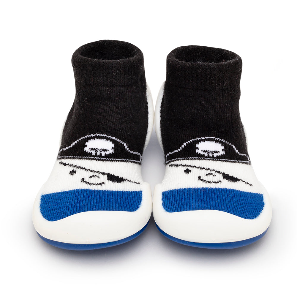 Pair of child's sock shoes with pirate design.