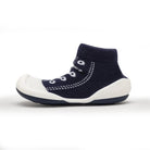 Navy blue sock shoe with white accents.