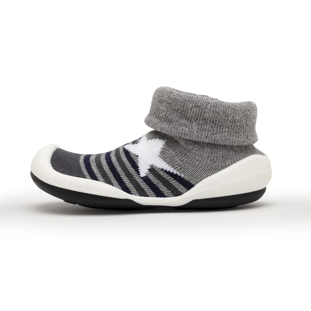 Gray striped sock shoe with a white star.