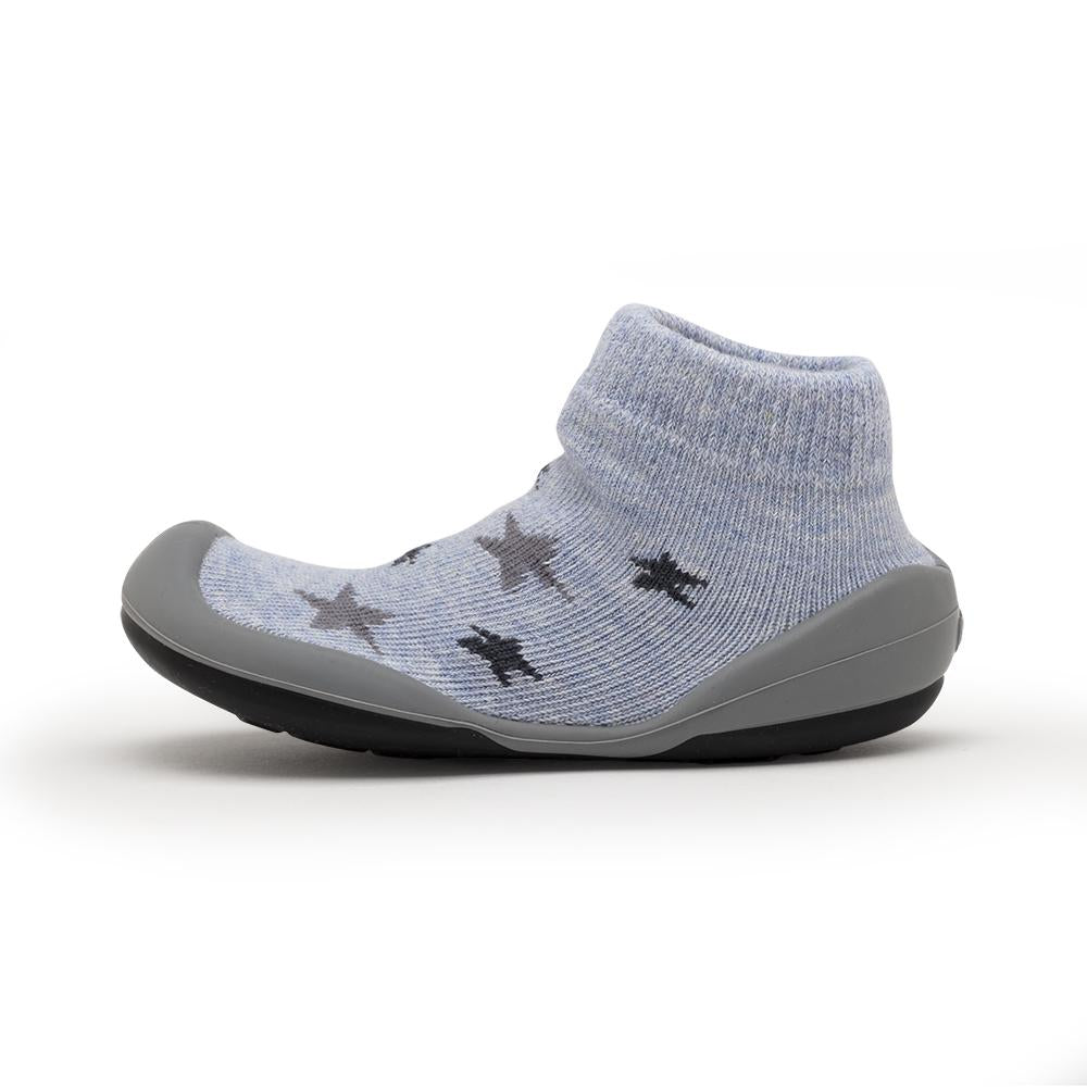 Light blue sock-shoe with star pattern and gray sole.