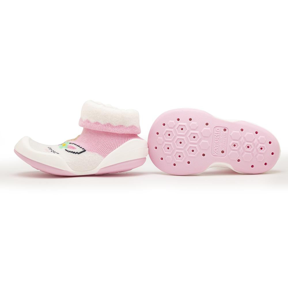 Pink and white baby shoe socks.