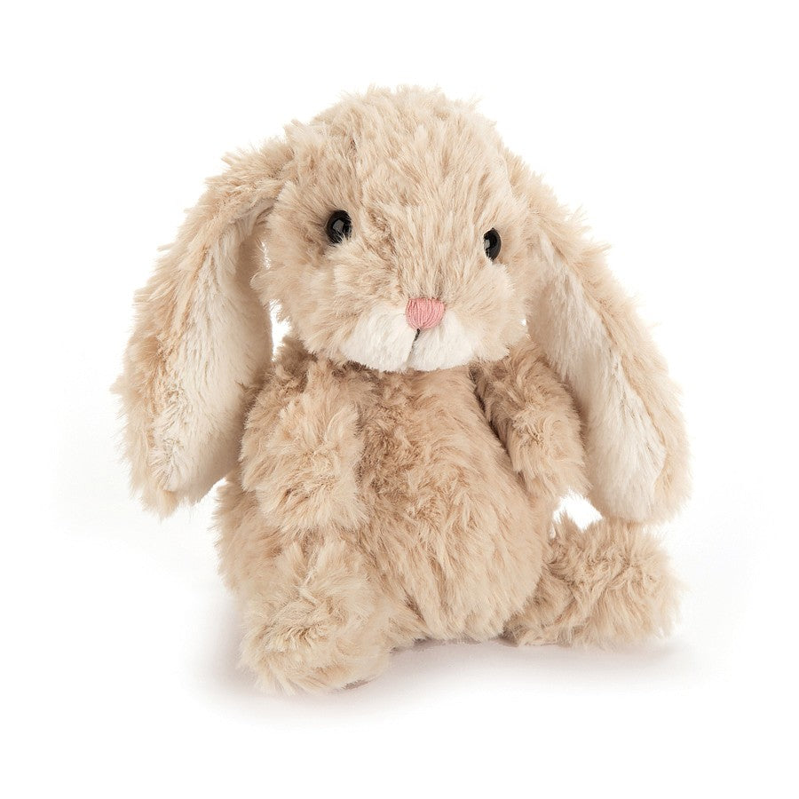 Tan plush bunny with long ears.