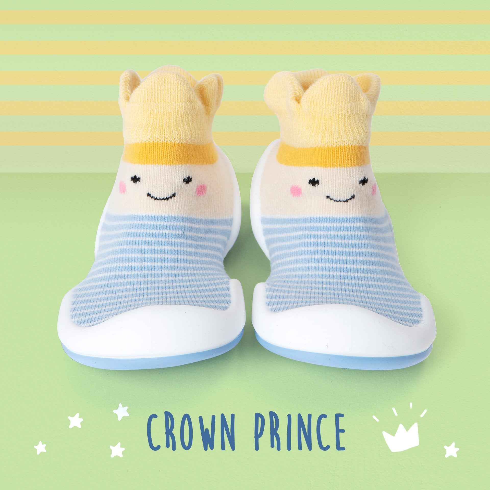 Pair of children's sock shoes with crown design.