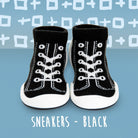 Two black sock sneakers on a blue background.