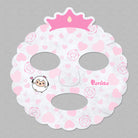 Pink and white heart patterned sheet mask with crown and cartoon lamb.