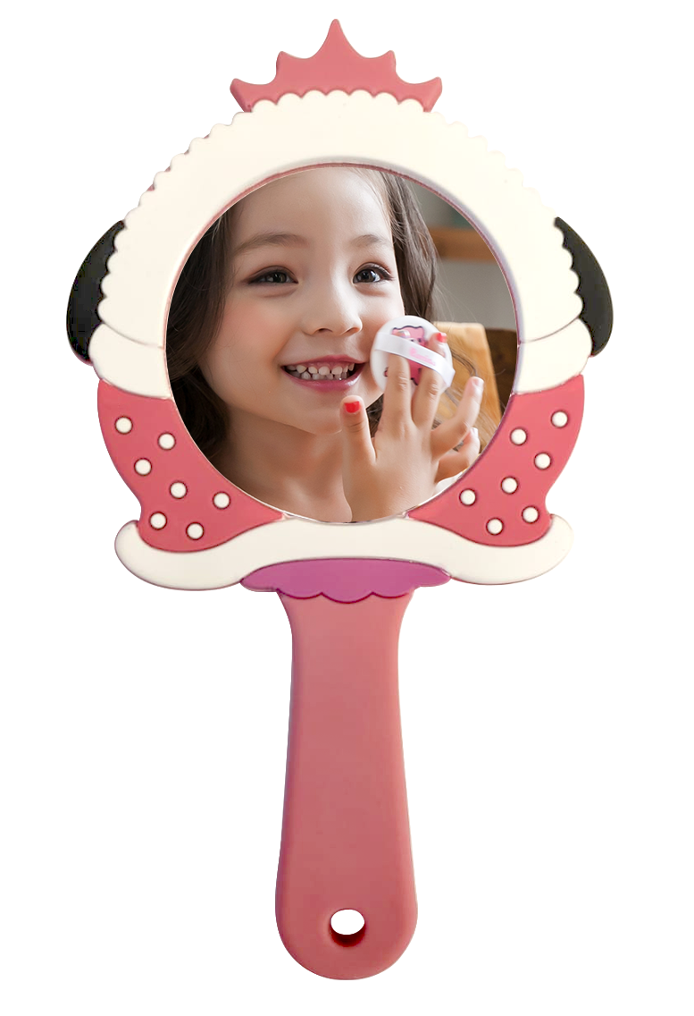 Little girl smiling in a handheld mirror while applying makeup.