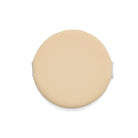 Tan makeup sponge with hand straps.