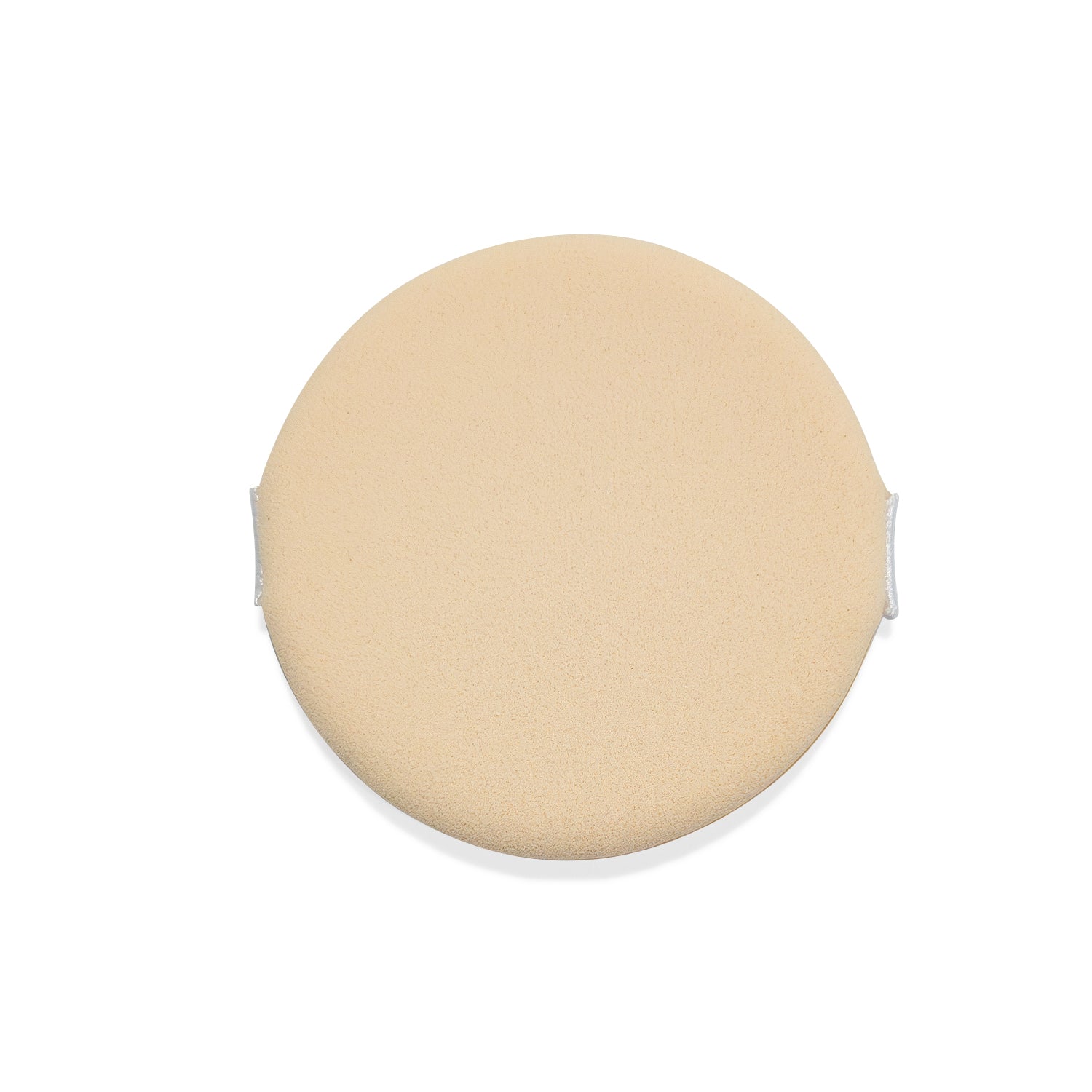 Tan makeup sponge with hand straps.