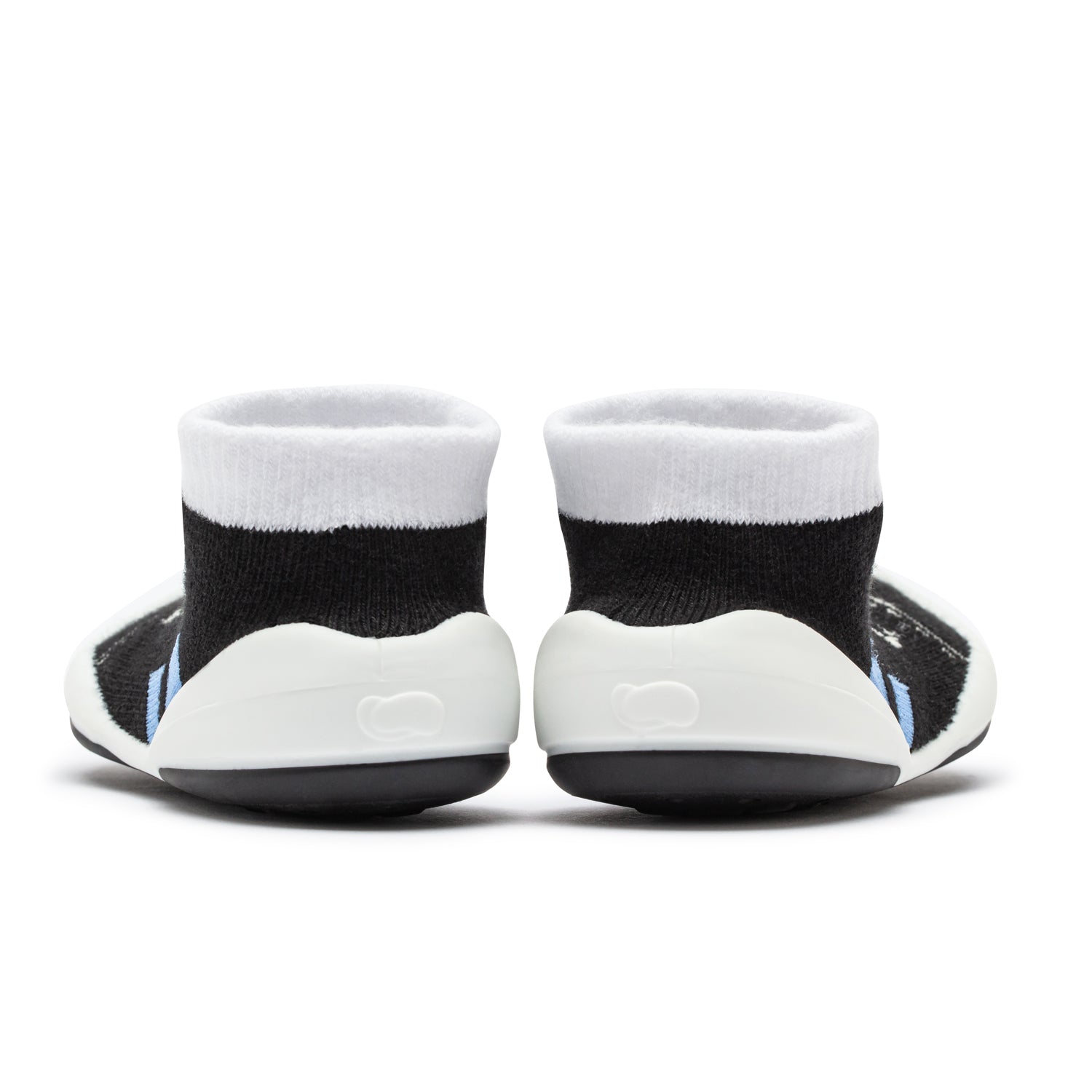 Two baby shoe-socks, white and black.