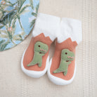 Baby socks with dinosaur appliqué.