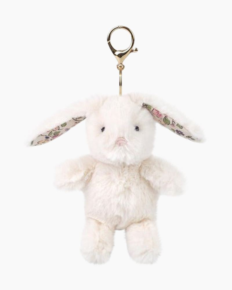 Plush bunny keychain with floral headband on a white background