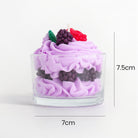 Purple cupcake-shaped candle with berries on top, shown with measurements on a white background