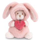Pink plush bunny holding a red heart on a white background