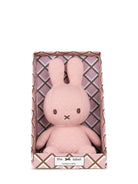 Pink Miffy plush in patterned box.
