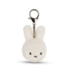 White plush bunny keychain with a clip on a white background