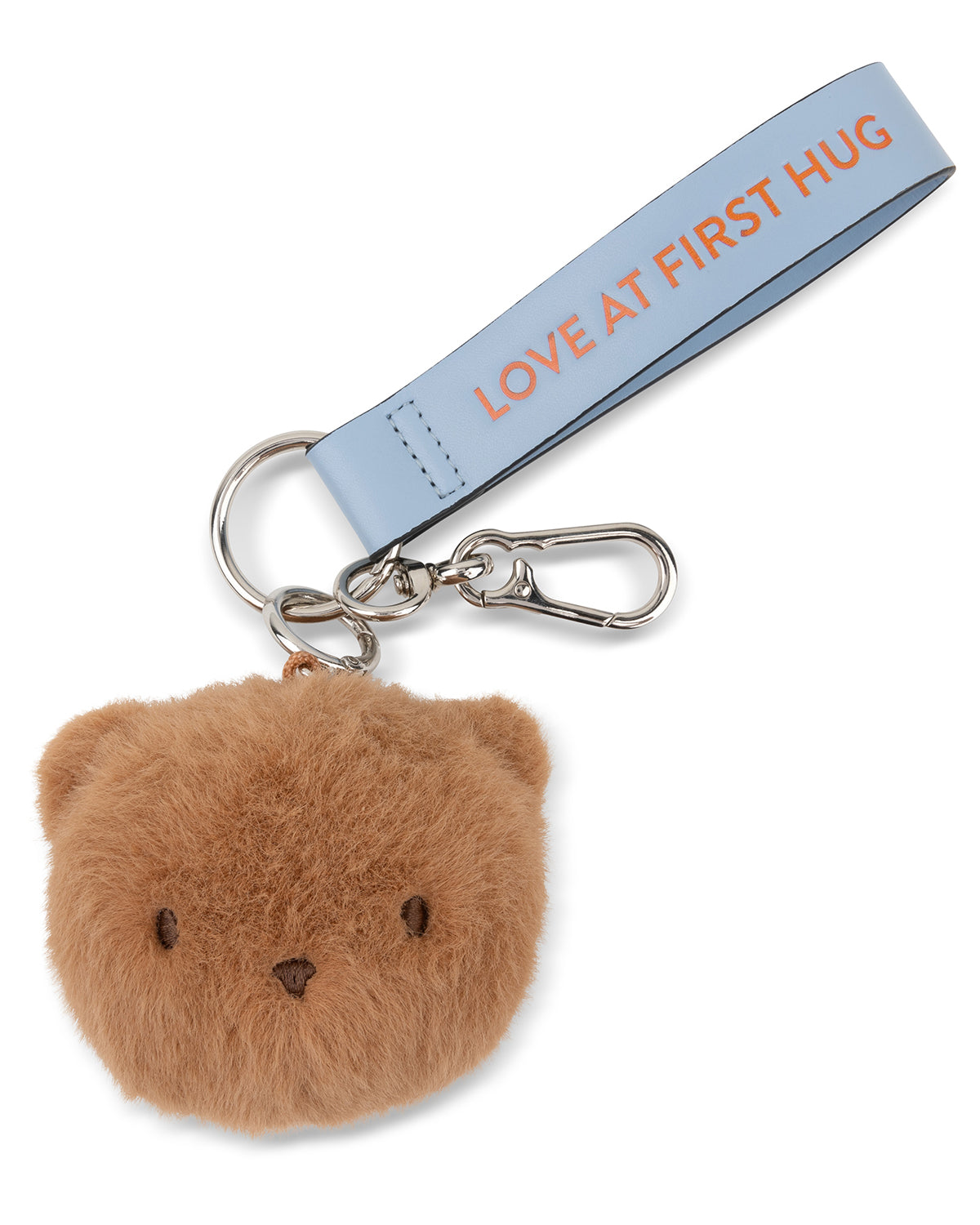 Fluffy bear-shaped keychain with a blue strap reading 'Love at First Hug' on a white background
