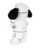 Stuffed poodle toy in tennis outfit, holding a racket.