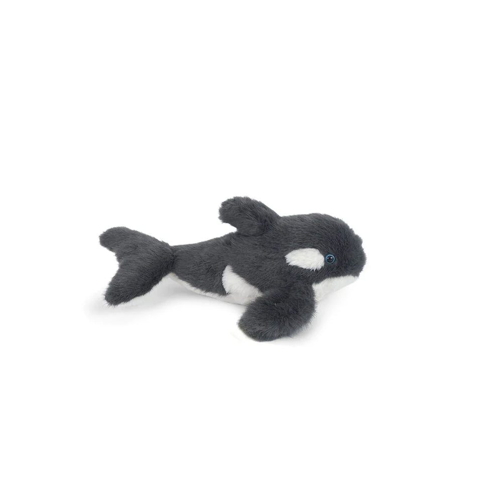 Plush toy orca whale on a white background