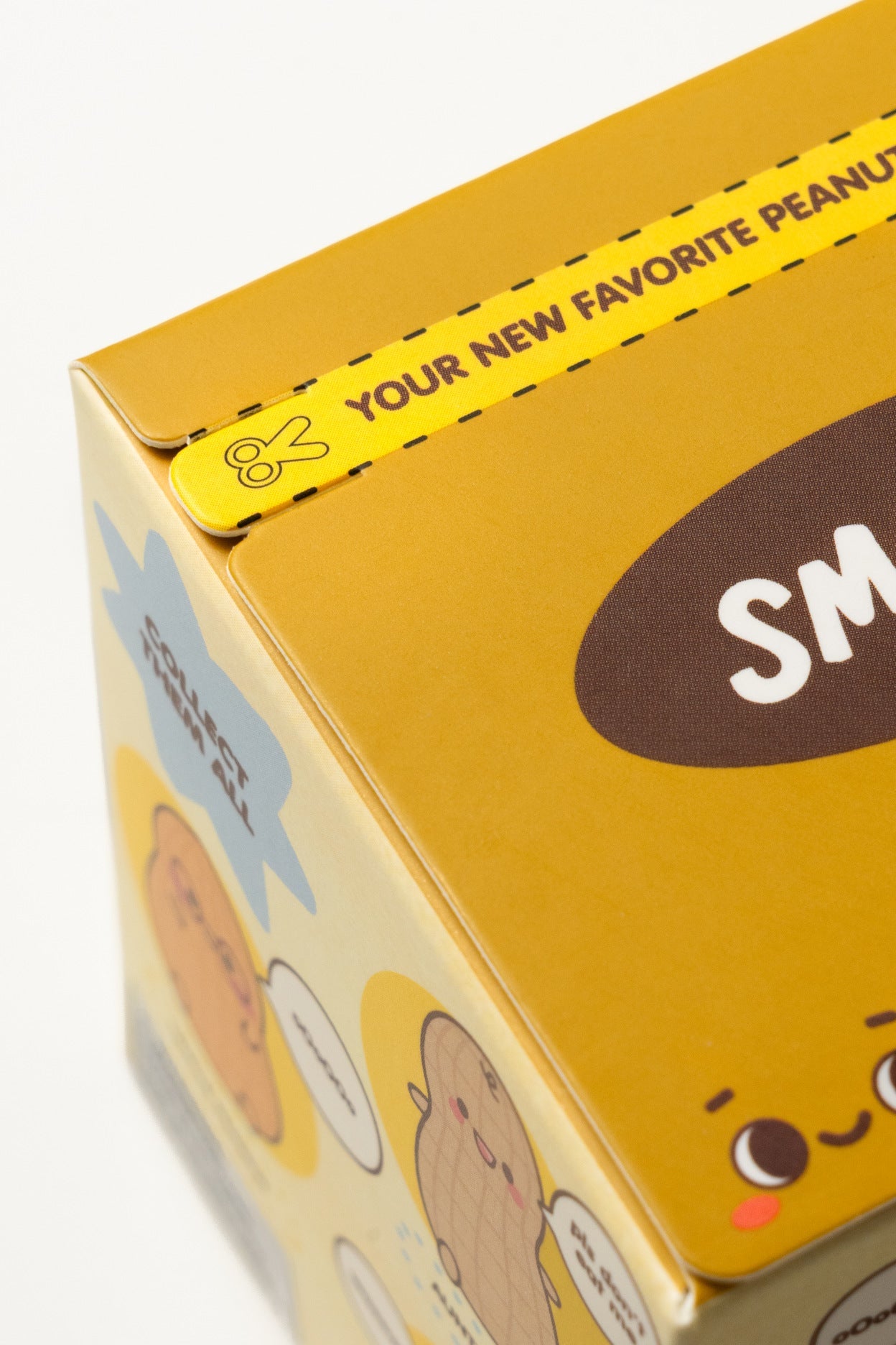 Yellow box with cartoonish design and text on a white background