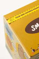 Yellow box with cartoonish design and text on a white background