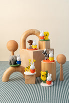 Set of colorful animal figurines on a white background