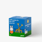 Blue and green box with Miffy and a giraffe on a white background