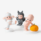 Three Halloween-themed figurines on a white background