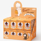 A retail display box of Keypie Halloween Blind Box items, featuring multiple small orange blind boxes with cartoon ghost and witch illustrations on a clean white background.