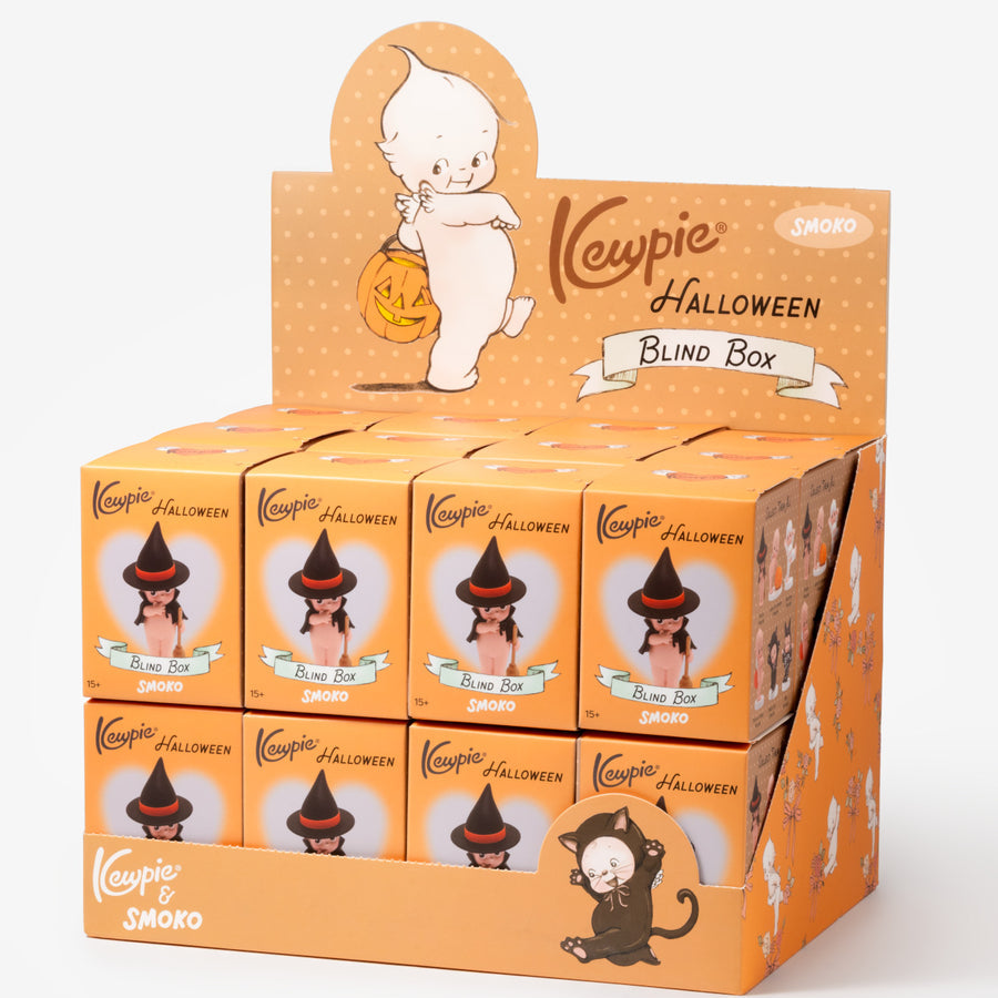 A retail display box of Keypie Halloween Blind Box items, featuring multiple small orange blind boxes with cartoon ghost and witch illustrations on a clean white background.