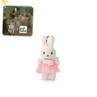Plush bunny keychain in a pink dress with 'The Met' and 'Just Dutch' branding on a white background.