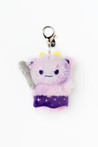 Plush keychain with a purple creature design on a white background
