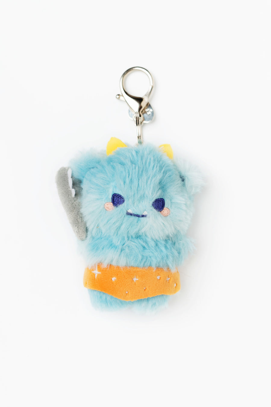 Plush keychain with a blue creature design on a white background