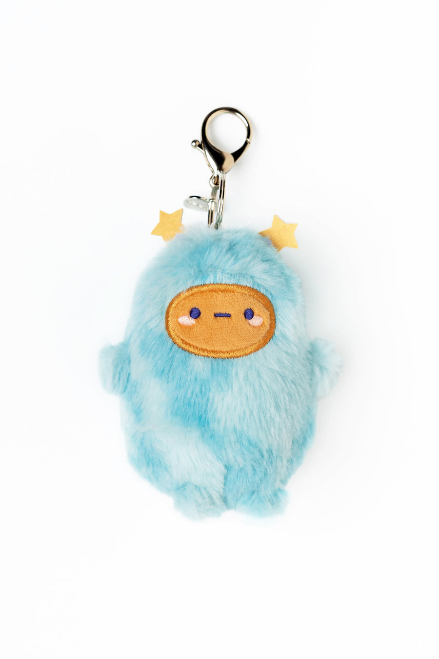 Plush keychain with a blue creature design on a white background