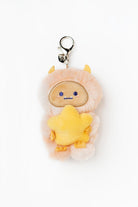 Plush keychain with a character holding a star on a white background