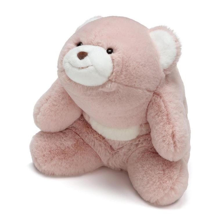 Pink teddy bear on a white background