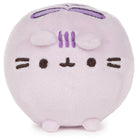Lavender round plush toy with a simple face design on a white background