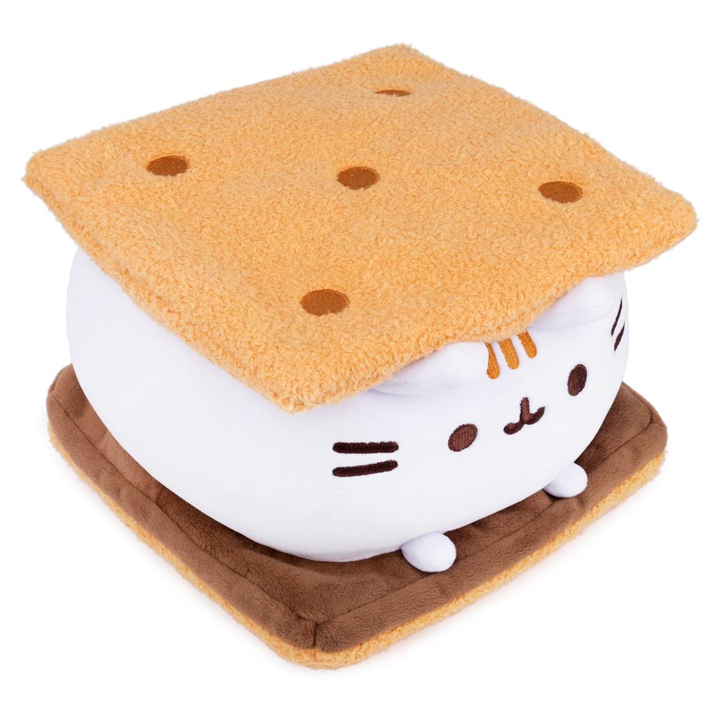 Cat-shaped marshmallow with graham cracker on a white background