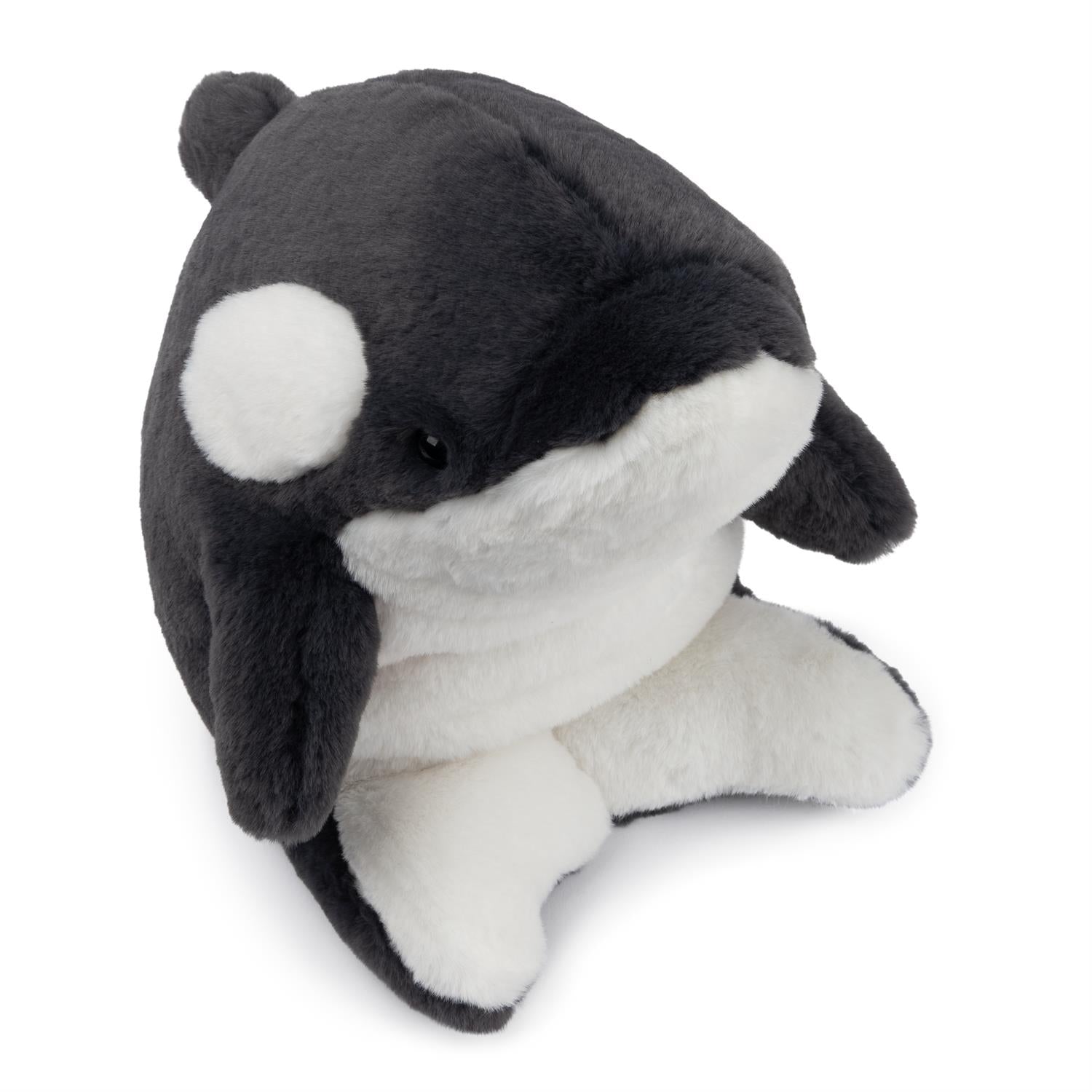 Plush toy resembling a penguin with a dark gray body and white face on a white background