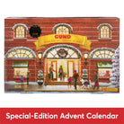Gund Advent Calendar special edition box featuring a festive Christmas storefront illustration with people, snow, and a red brick facade. The box includes a black circular 'Gund' brand seal and a red banner at the bottom reading 'Special-Edition Advent Calendar'.