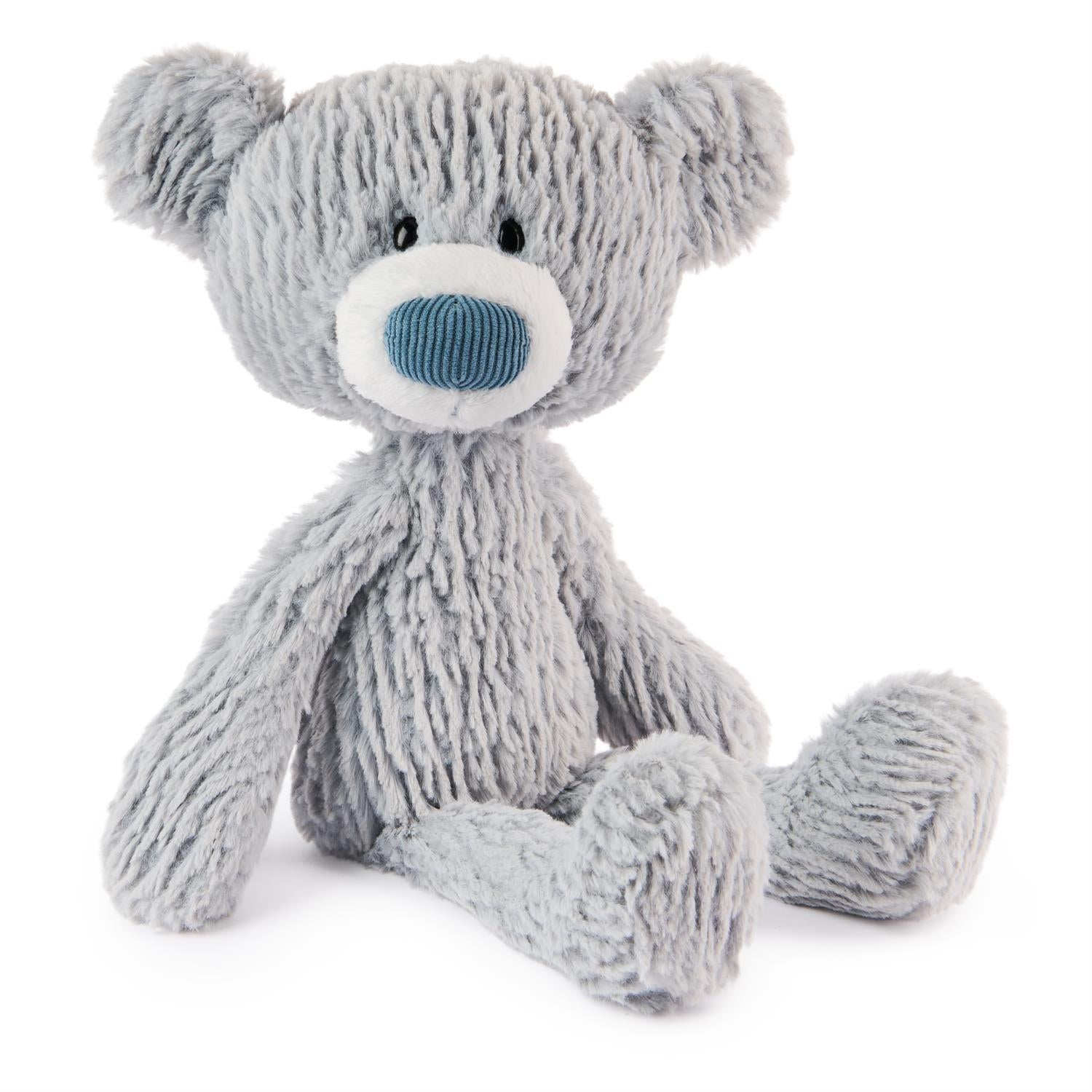 Plush teddy bear with a blue nose on a white background