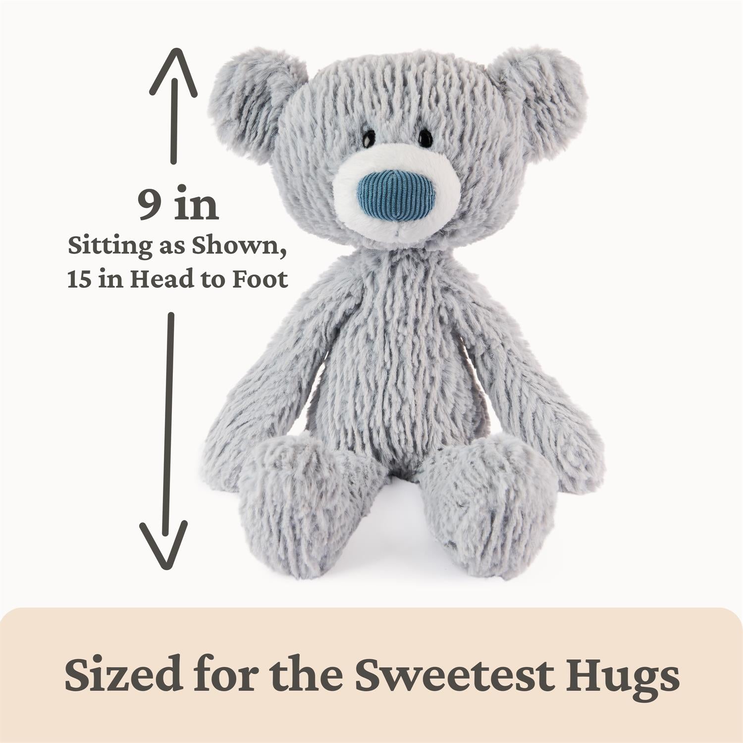Gray plush bear toy with size indication on a white background