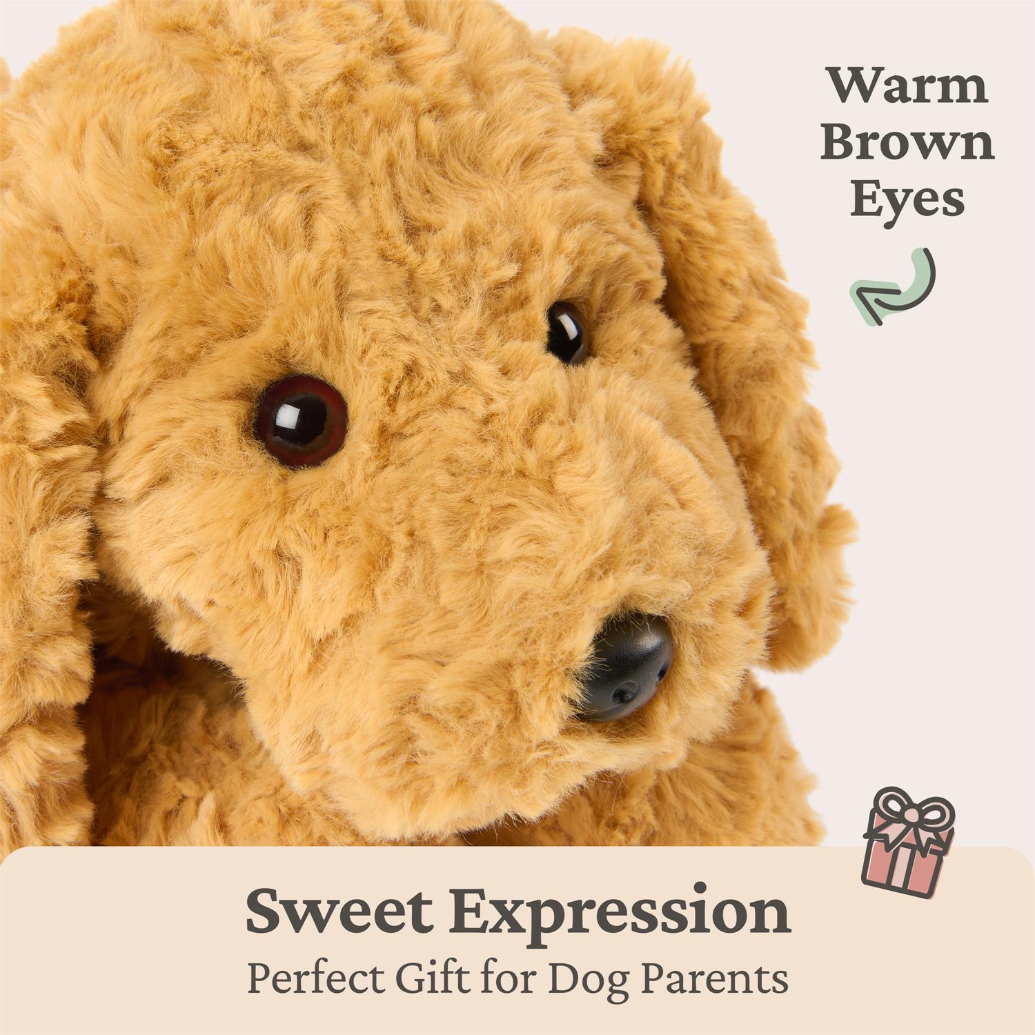 Close-up of a plush dog toy with warm brown eyes on a light beige background.