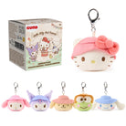 Plush keychains with a box labeled 'Gund Hello Kitty and Friends' on a white background