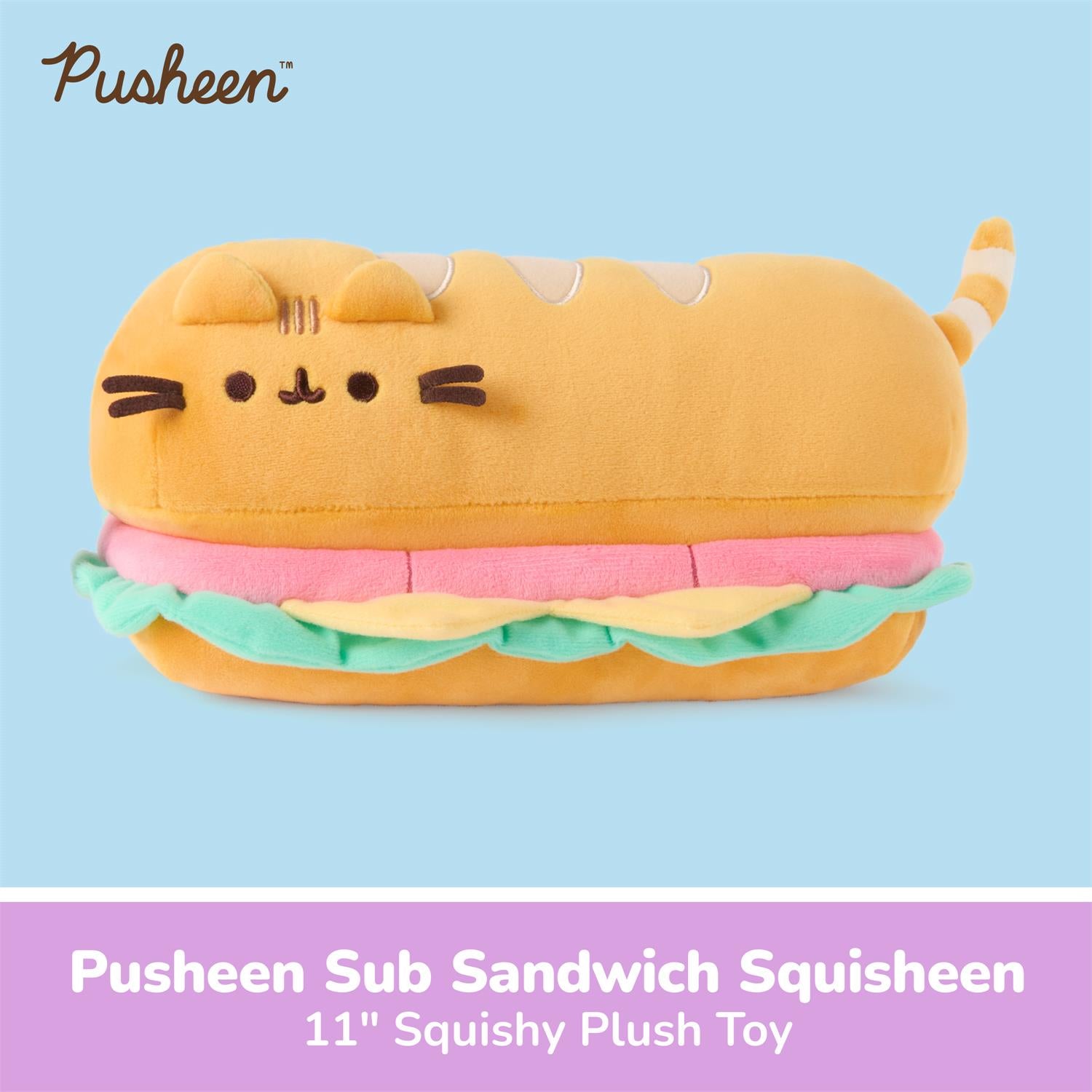Pusheen Sub Sandwich Squisheen plush toy shaped like a sub sandwich, featuring Pusheen's face on the bread, pink and green ruffles, and a striped tail, shown on a light blue background with a purple text banner at the bottom.