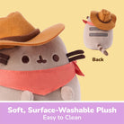 A plush toy character wearing a brown cowboy hat and pink bandana, shown on a pale yellow background with a smaller inset view labeled 'Back' and text at the bottom reading 'Soft, Surface-Washable Plush Easy to Clean'.