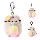 Plush keychain of a cat character with a pastel-colored balloon on a white background