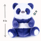 A plush panda toy in dark blue and white, shown seated against a light cream background with a vertical 8-inch height marker and small star graphics.
